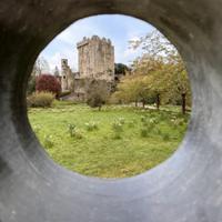 Blarney Castle through a circle stone