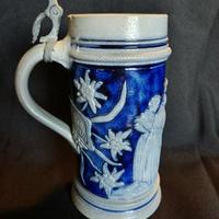 Blue beer stein with broken lid