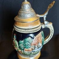 Small ceramic beer stein with pewter lid